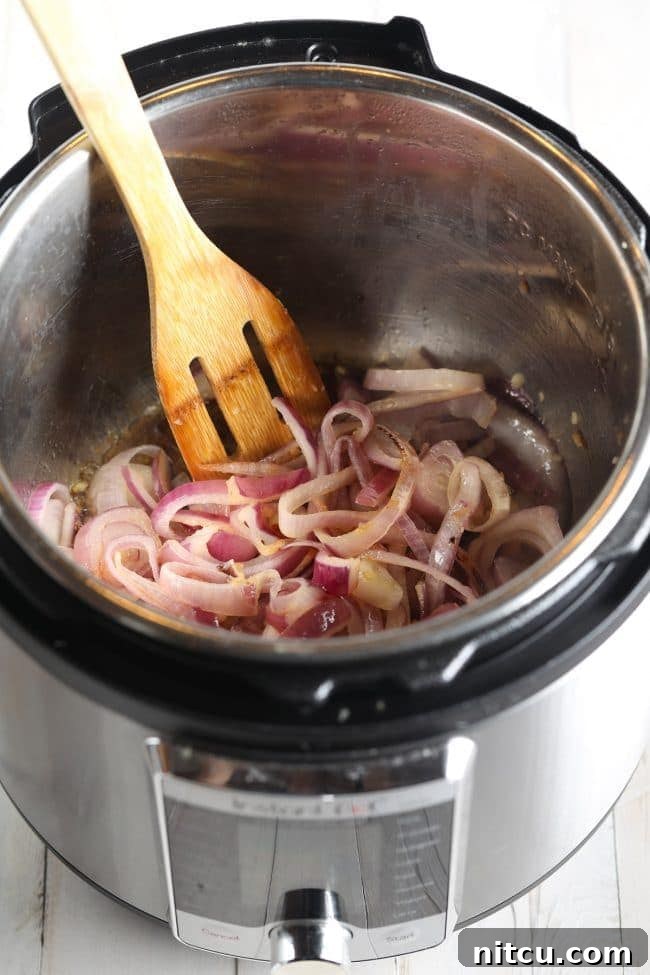 Savory Italian Beef 6 Preparation step: Beef chuck roast ready for the Instant Pot, showing ingredients arranged.