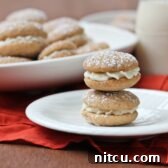 Aromatic Chai Cookies 2 Beautifully arranged Chai Latte Sandwich Cookies dusted with powdered sugar
