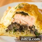 Finished Salmon Coulibiac (Salmon Wellington) in puff pastry.