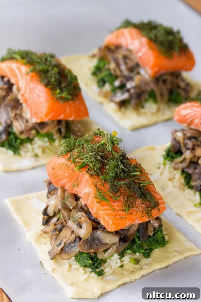 Regal Salmon Pie 8 Fresh dill being sprinkled generously over a salmon fillet in a partially assembled Salmon Coulibiac, adding aromatic flavor.
