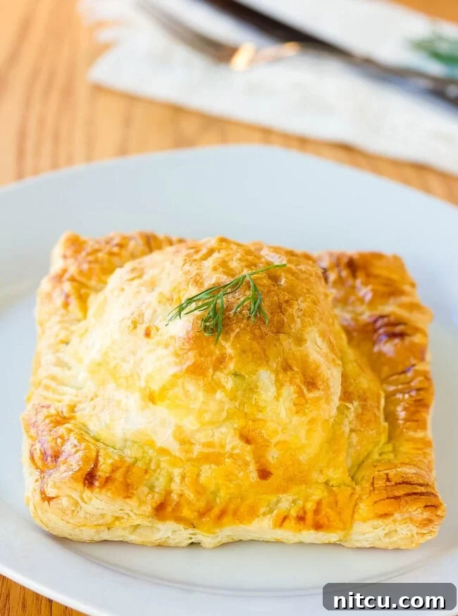 Regal Salmon Pie 9 Individual Coulibiac of Salmon, perfectly wrapped in puff pastry and baked to a golden crisp, ready to be served.