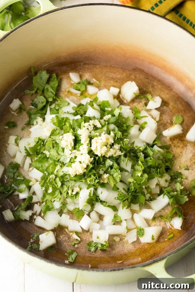 How To Make Chicken Tortilla Soup - saute vegetables in pot