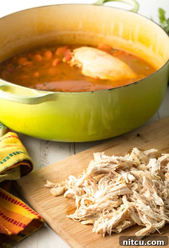 How To Make Easy Chicken Tortilla Soup - add chicken back to soup