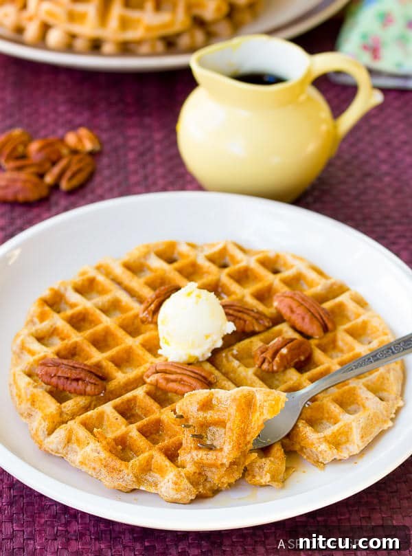 Close-up of a perfectly crispy Spelt Waffle, ready to be topped.