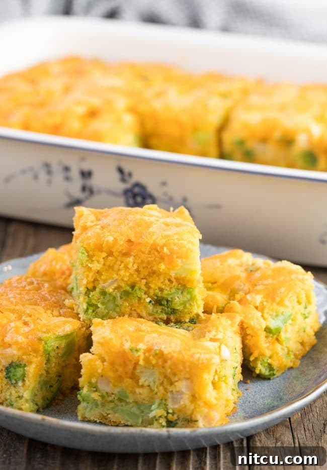 Garden Harvest Cornbread 5 Fluffy Broccoli Cheese Cornbread squares neatly stacked on a blue plate