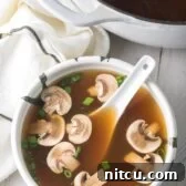 Japanese Clear Soup Recipe: A light and healthy broth, perfect as a Hibachi starter. #ASpicyPerspective #hibachi #clearsoup #onionsoup