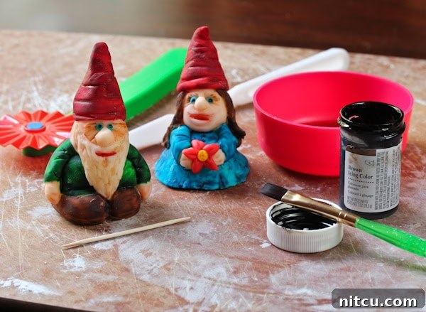 Easy Homemade Fondant 15 Painted fondant garden gnomes.