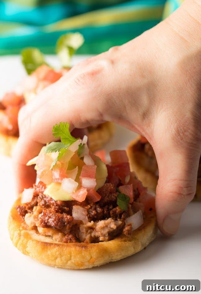 Sopes picked up by hand