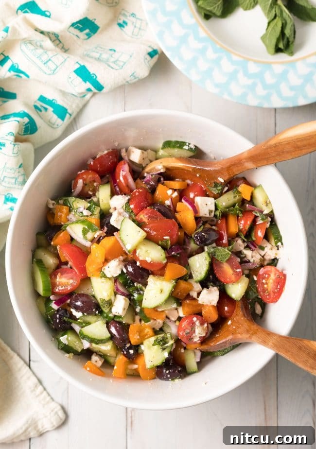 Horiatiki Greek Village Salad 4 Authentic Horiatiki (Greek Village Salad) Recipe with a block of feta cheese on top, ready to be served. #greek #salad #glutenfree #lowcarb #keto #vegetarian