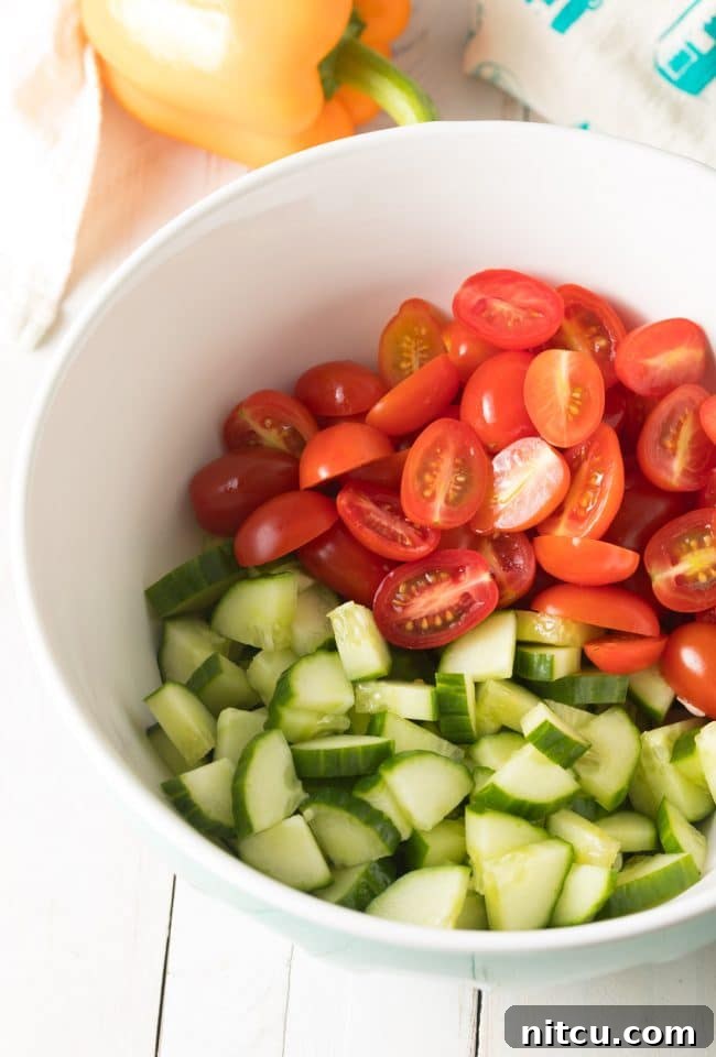 Horiatiki Greek Village Salad 5 Greek Horiatiki (Village Salad) Recipe showing ingredients being chopped. #greek #salad #glutenfree #lowcarb #keto #vegetarian