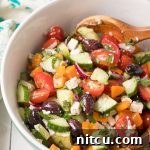 Horiatiki (Greek Village Salad) Recipe: a close-up of the vibrant salad ingredients.