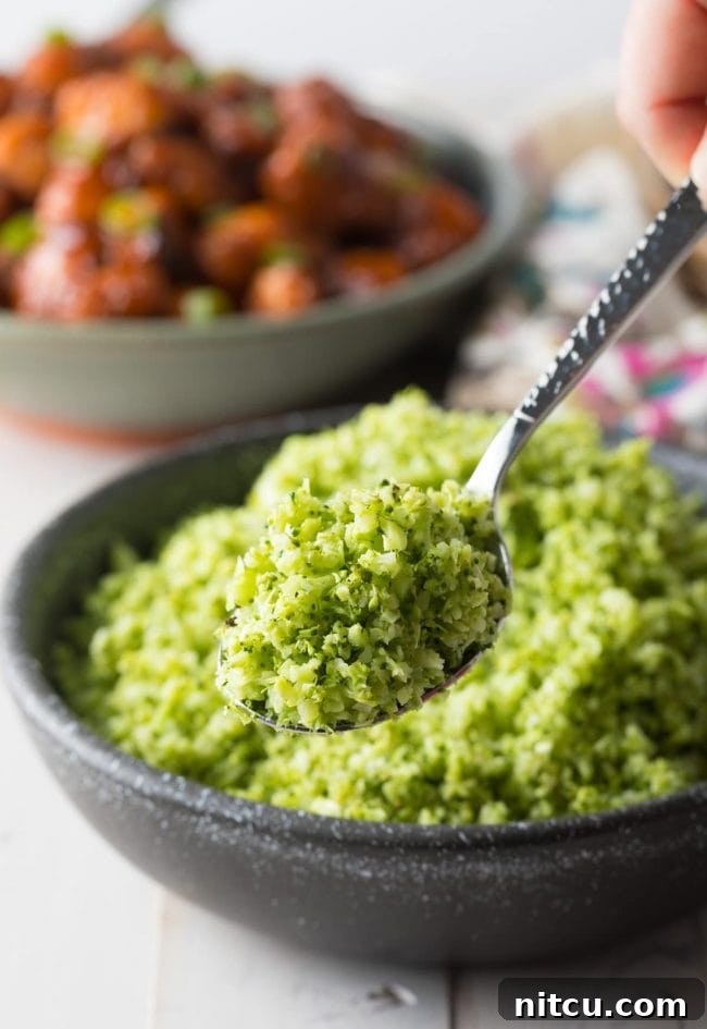Nutrient-Packed Broccoli Rice 12 A metal spoon displaying the fine texture of this homemade broccoli rice recipe