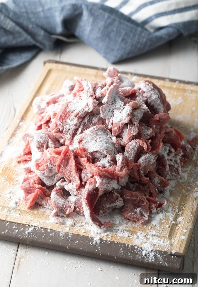 Easy Szechuan Beef Stir-Fry 5 Flour up the schezwan beef recipe before adding it to the wok