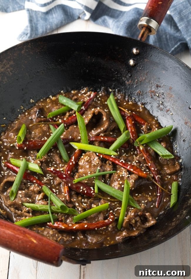 Easy Szechuan Beef Stir-Fry 7 Added veggies to the pan with the szechuan beef and peppers