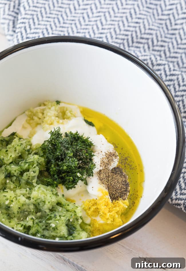 Refreshing Greek Cucumber Dip 6 Ingredients for tzatziki sauce in a bowl.