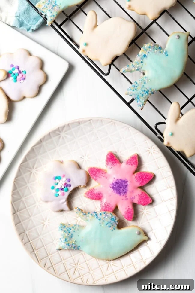 roll out sugar cookies decorated and served on a plate