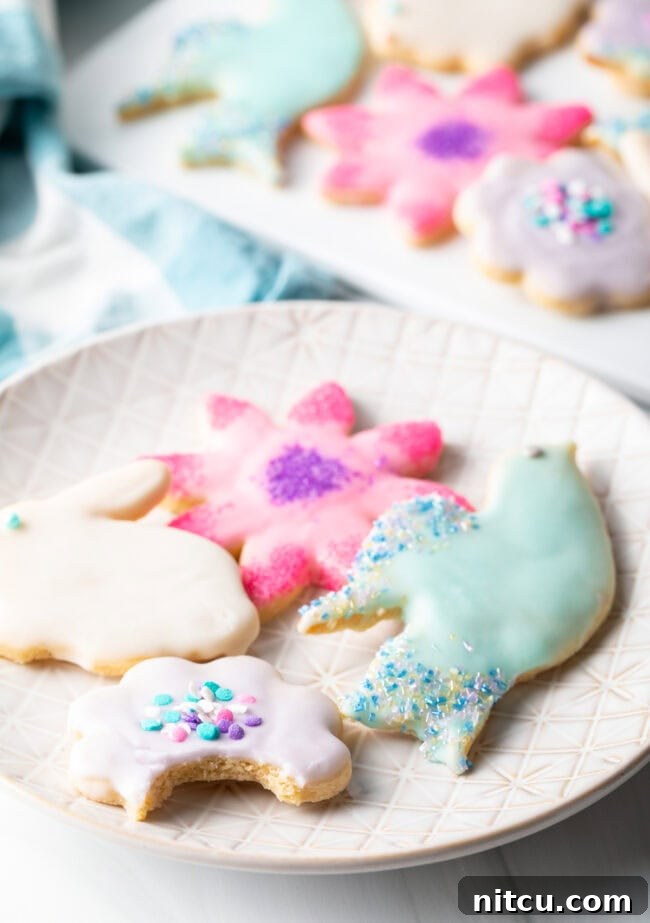 best iced sugar cookies in spring shapes of white plate
