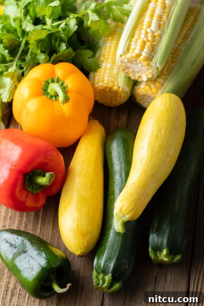 Ingredients needed to make this calabacitas recipe, neatly arranged on a counter.