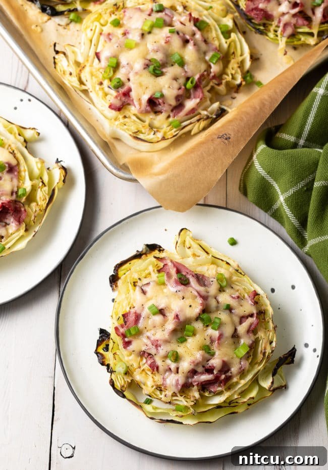 Keto Irish Roasted Cabbage Pizza 2 Delicious Irish Roasted Cabbage Low Carb Pizza with corned beef and Dubliner cheese on roasted cabbage steaks.