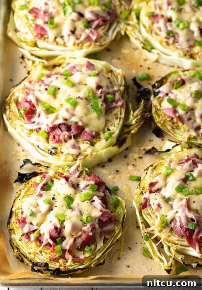 Keto Irish Roasted Cabbage Pizza 11 Chef's hands preparing the toppings for a Low Carb Pizza on cabbage steaks.