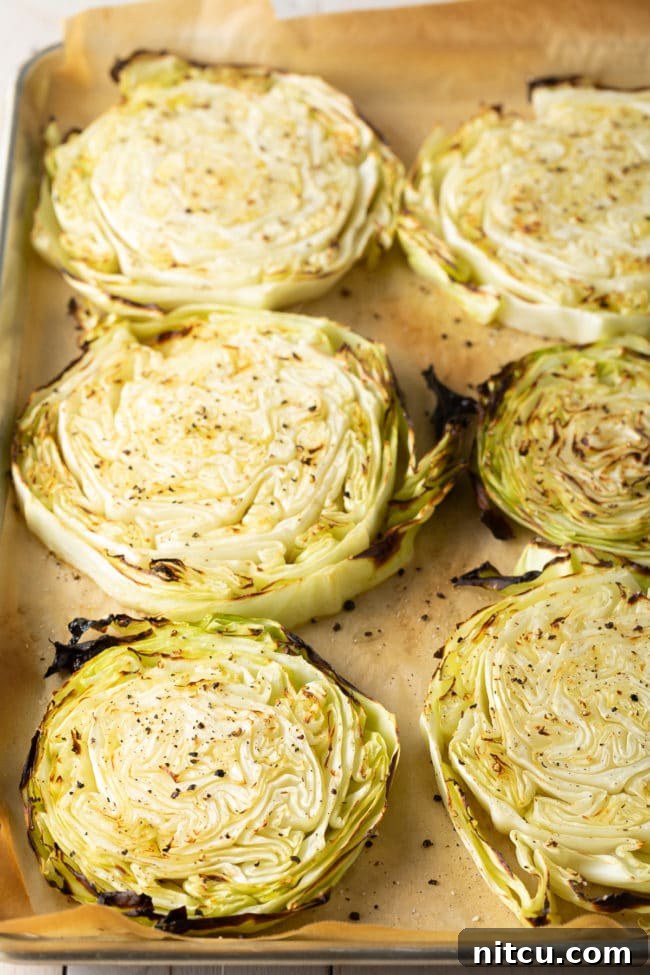 Keto Irish Roasted Cabbage Pizza 6 Uncooked sliced cabbage rounds ready to be roasted into cabbage steaks.