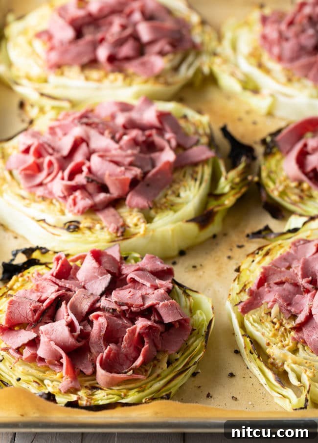 Keto Irish Roasted Cabbage Pizza 8 Sliced corned beef, a delicious topping for keto pizza.