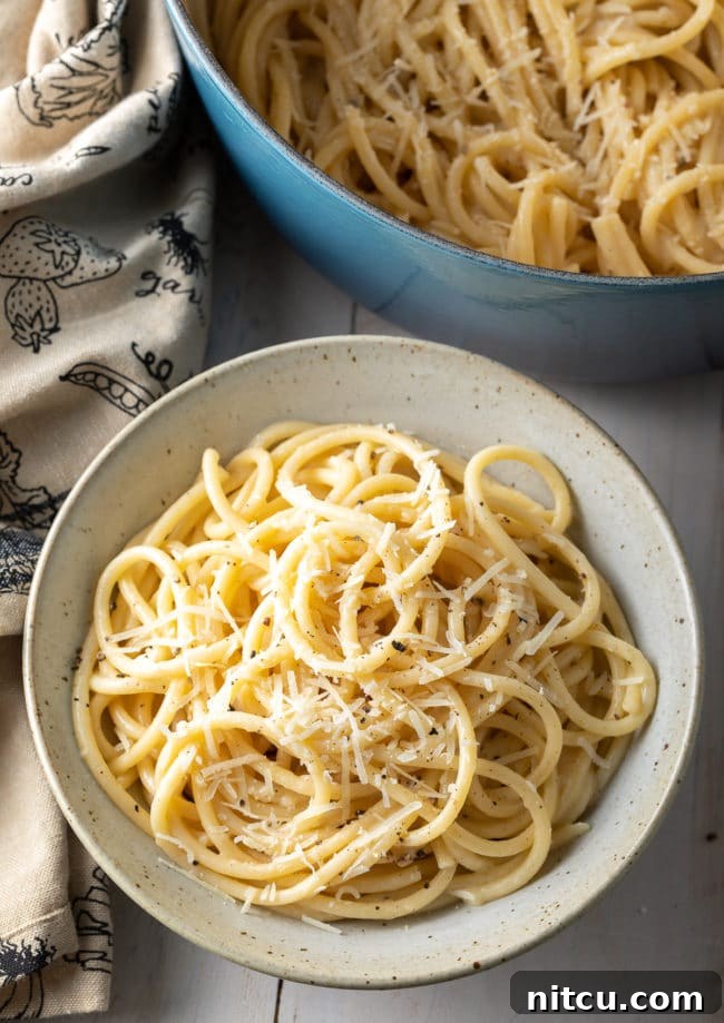 Exquisite Cacio e Pepe dish served in a elegant bowl, ready to be enjoyed.