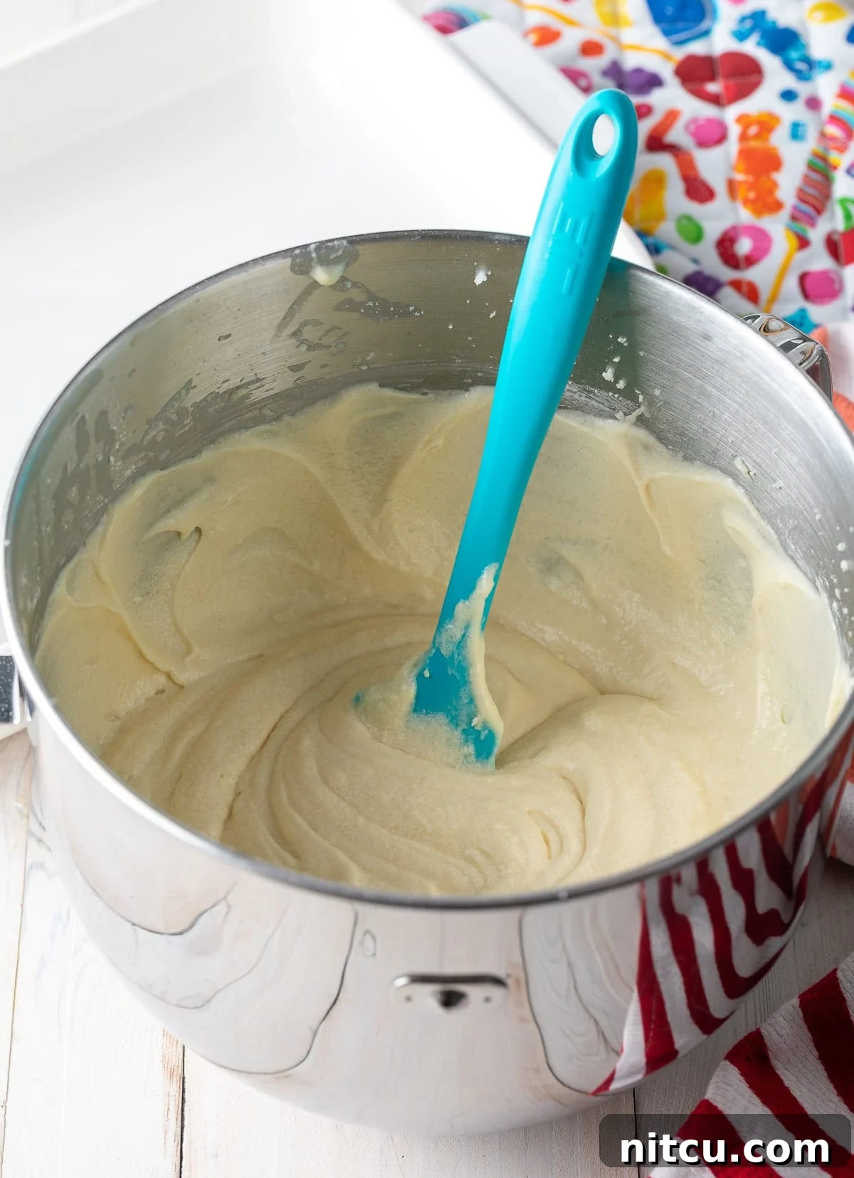 Fluffy Vanilla Cake From Scratch 7 Smooth cake batter perfectly mixed in a stand mixer bowl.