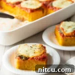 Golden Polenta Bake 10 Margherita Baked Polenta: An Easy, Cheesy Polenta Recipe layered with marinara sauce, fresh basil, and mozzarella cheese, all on a comforting Pesto Polenta base!