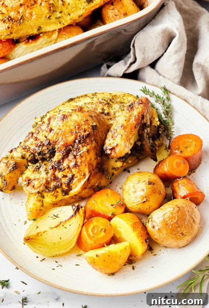 Juicy Cornish Hen Perfection 4 Cornish game hens recipe on plate with vegetables