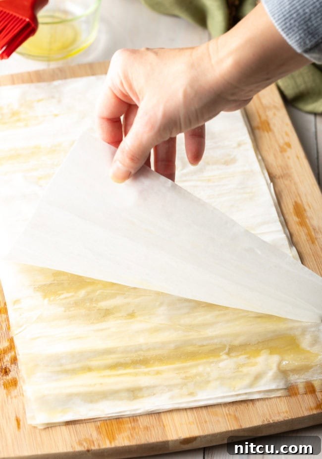 Savory Spinach Pie 10 Perfectly stacked and brushed phyllo sheets, forming the crispy, flaky base and top layers for the savory pie.