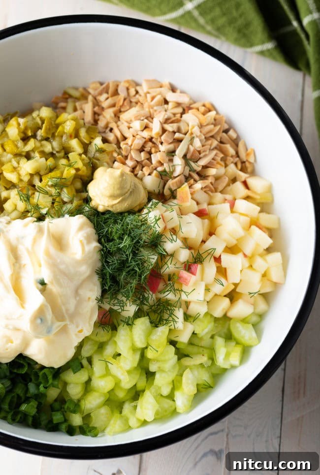 Southern Comfort Chicken Salad 4 Ingredients for chicken salad, chicken, mayo, celery, apples, pickles, almonds, scallions, dill
