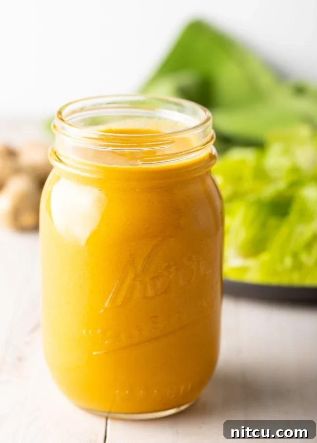 Vibrant Ginger Sesame Dressing 5 Japanese Ginger Dressing - Hibachi salad dressing in a jar. A close-up of the homemade Japanese Ginger Dressing, ready for storage or serving.