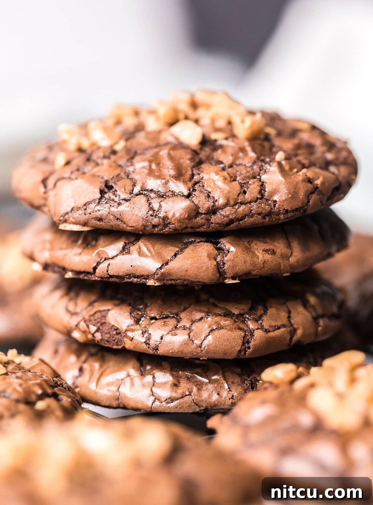 Toffee Fudge Cookies 3 Toffee Brownie Cookies stacked on rack