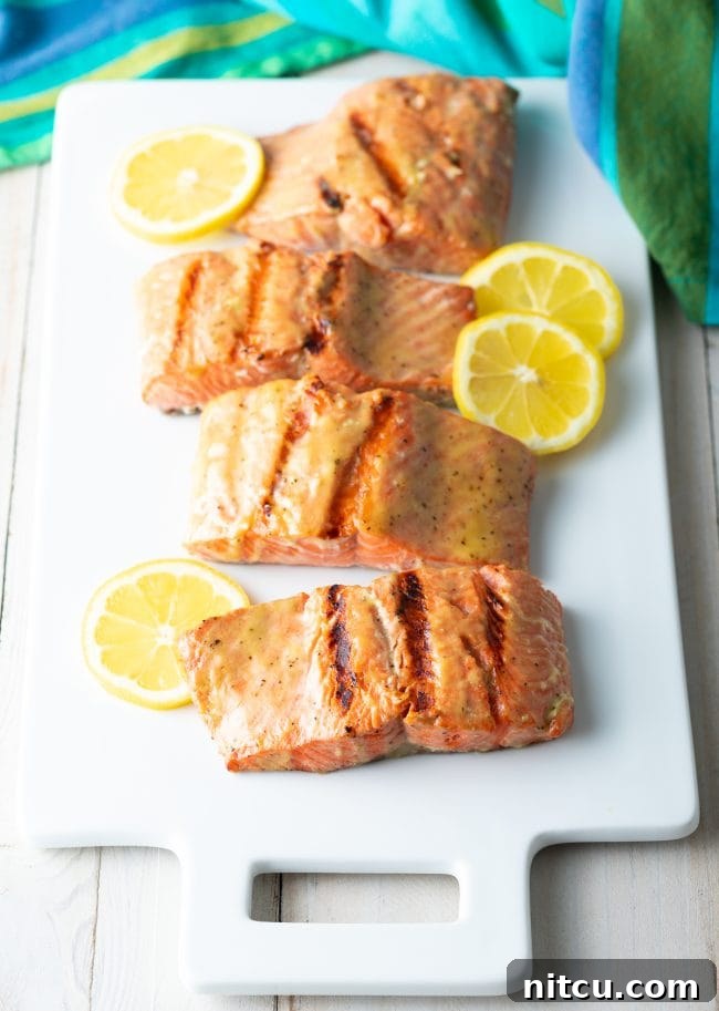 Pineapple Glazed Salmon Delight 10 Grilled salmon on a platter.