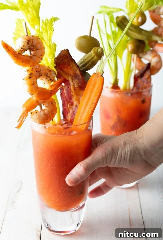 Your Signature Bloody Mary Base 11 virgin bloody marys with lots of toppings.