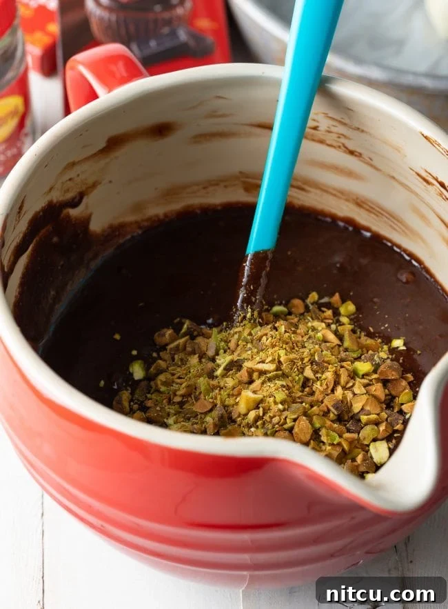 Gluten Free Flourless Fudgy Chocolate Brownie Cake 5 brownie cake batter with pistachios