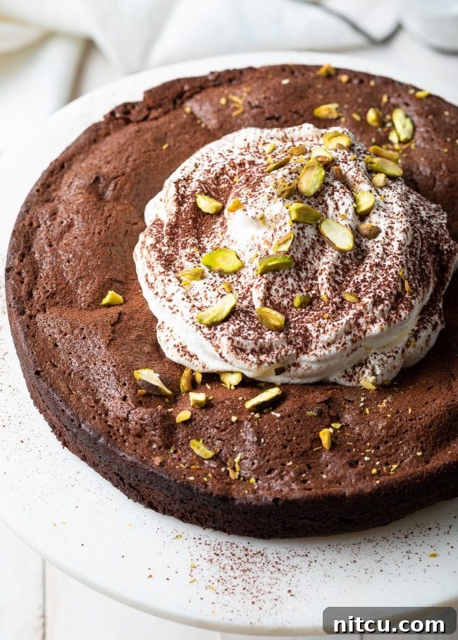Gluten Free Flourless Fudgy Chocolate Brownie Cake 8 gluten free dessert - brownie cake on stand