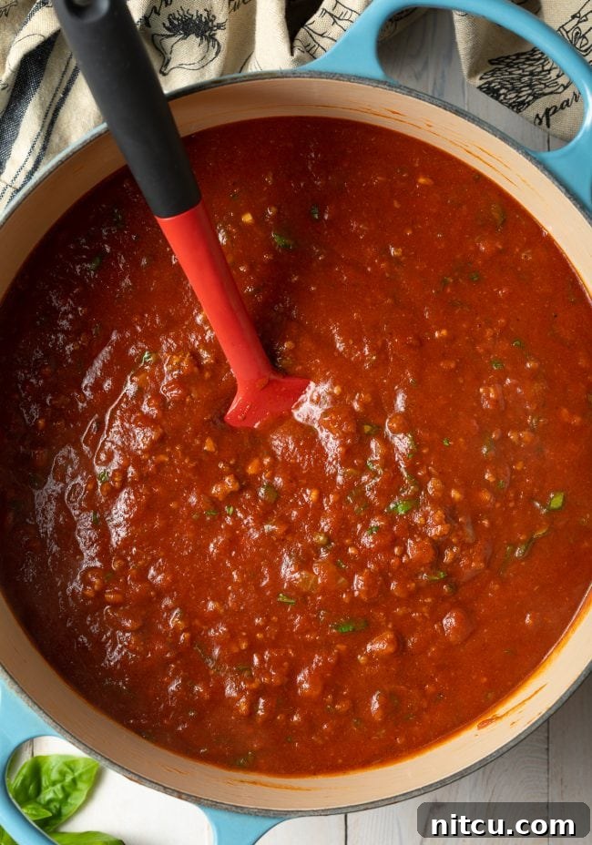 The Ultimate Spaghetti and Meat Sauce 6 Meat sauce for spaghetti in a large pot.