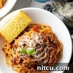 The Ultimate Spaghetti and Meat Sauce 9 Budget friendly plate of spaghetti with meat sauce.