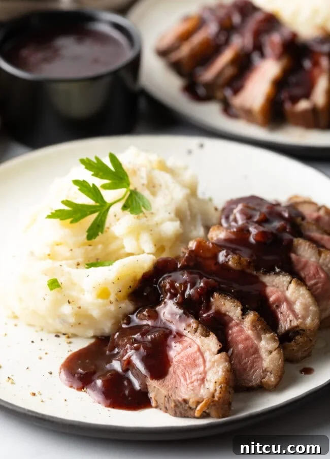 duck breast recipe served with blackberry sauce and creamy mashed potatoes