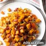 Sweet Potato and Bell Pepper Hash 9 Sweet Potato Hash Browns on a white plate