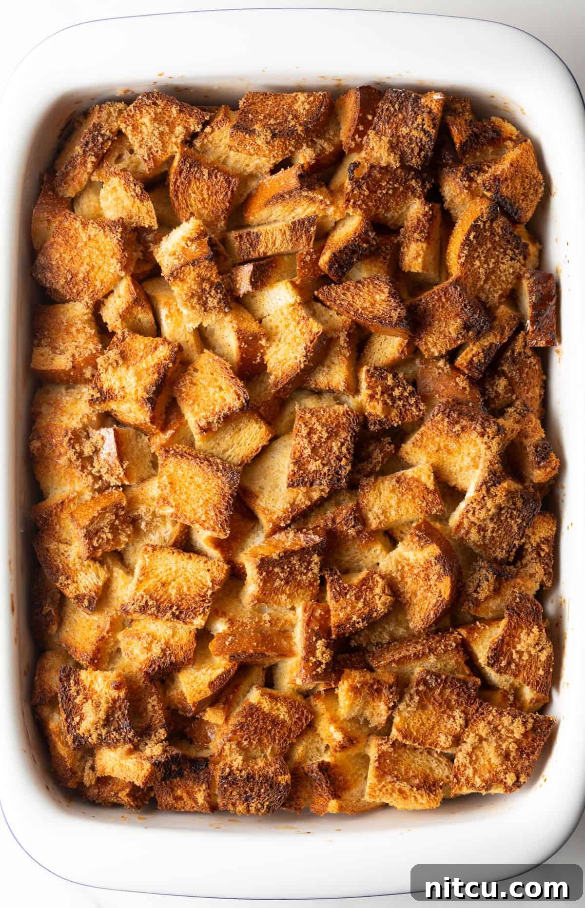 An overhead shot of freshly baked and golden overnight French toast casserole.